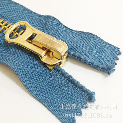 上海星利拉鏈 專業供應牛仔褲與夾克衫拉鏈，品質與服務的承諾